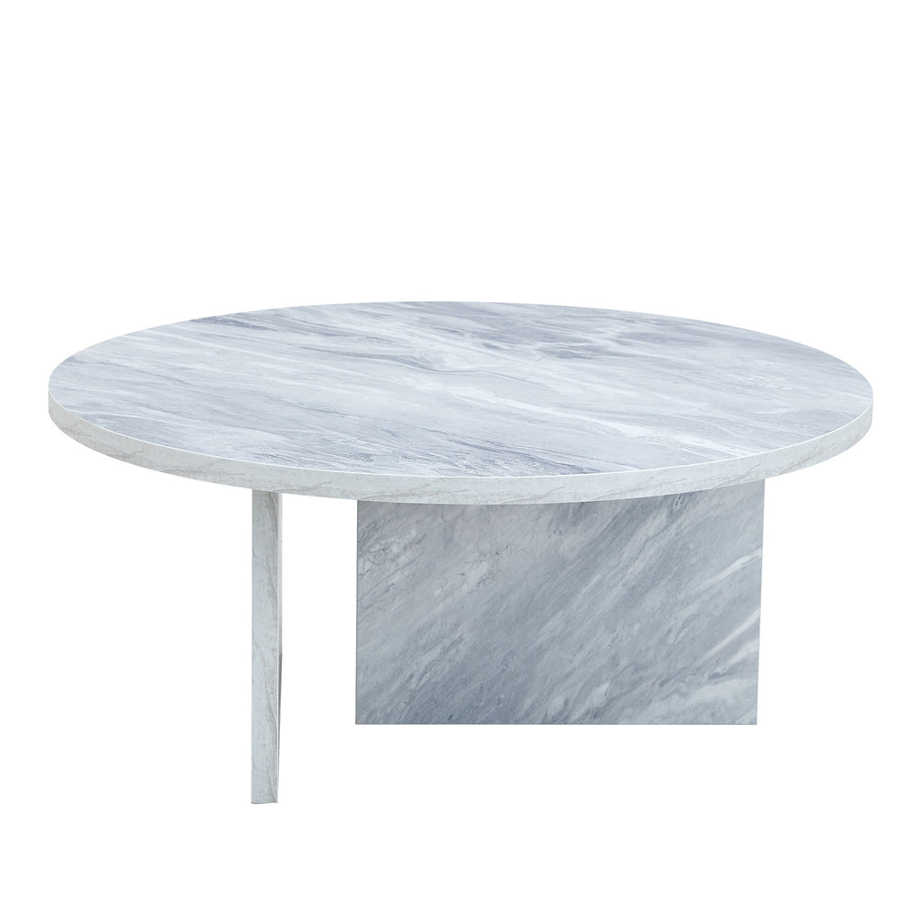 Versatile Round Coffee Table For Various Interior Styles