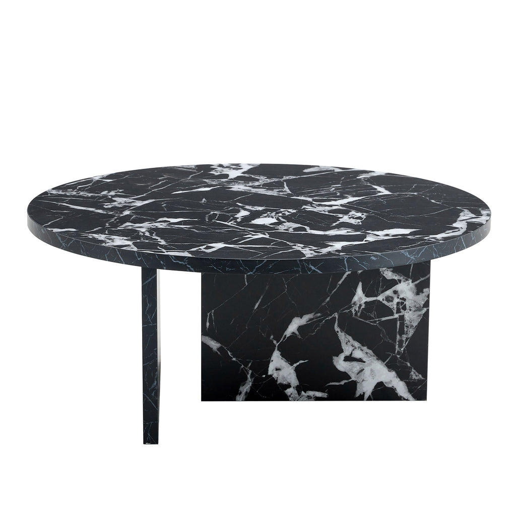 Versatile Round Coffee Table For Various Interior Styles