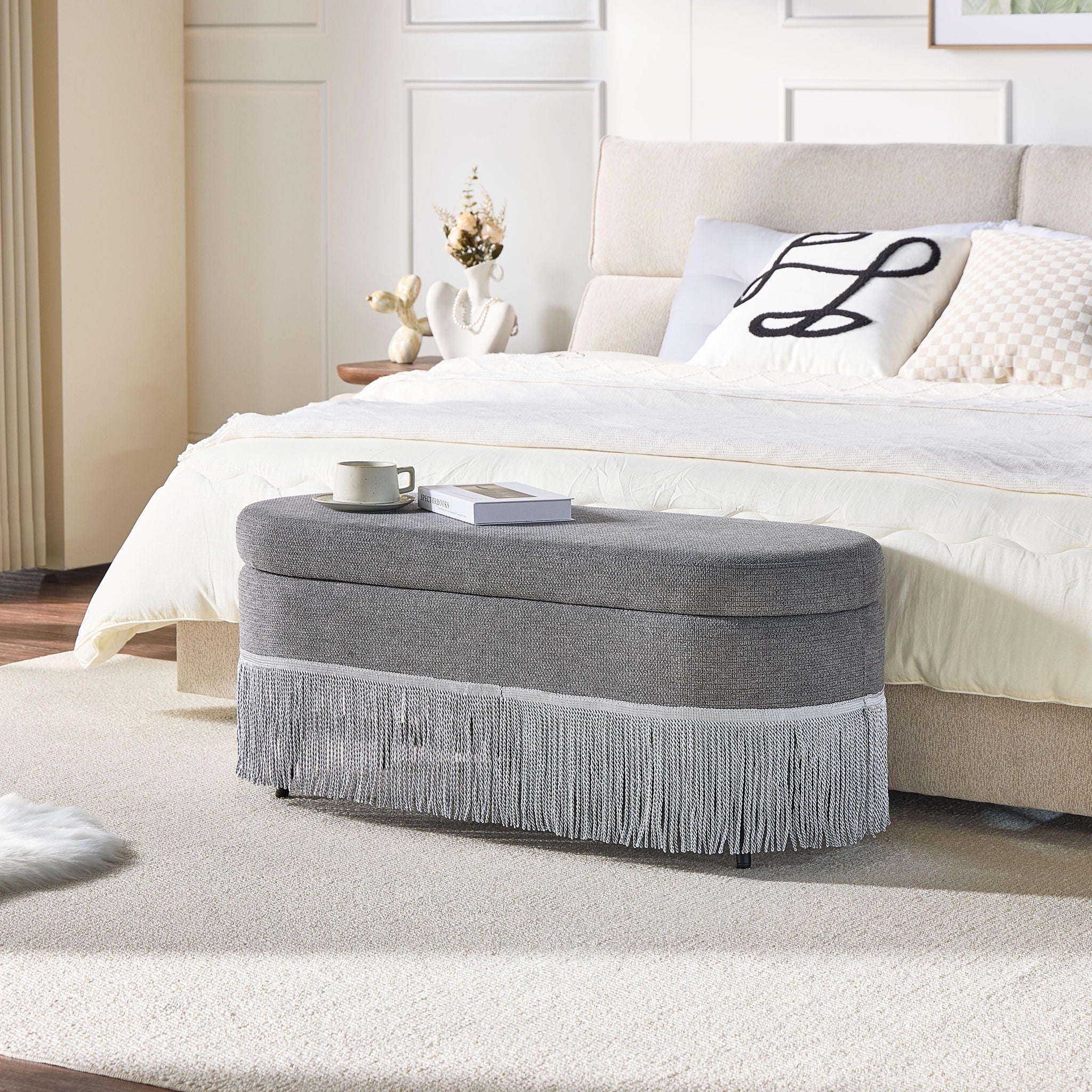 Oval Upholstered Storage Ottoman With Fringe Trim & Lift Top Lid
